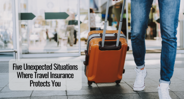 image of a man rolling a suitcase