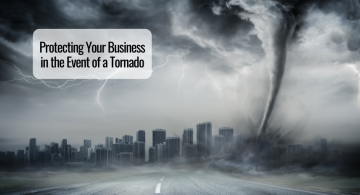 image of tornado approaching a city; commercial buildings in the skyline
